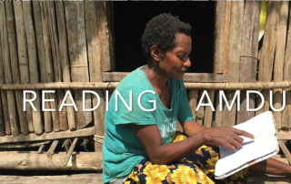 Amdu woman reading