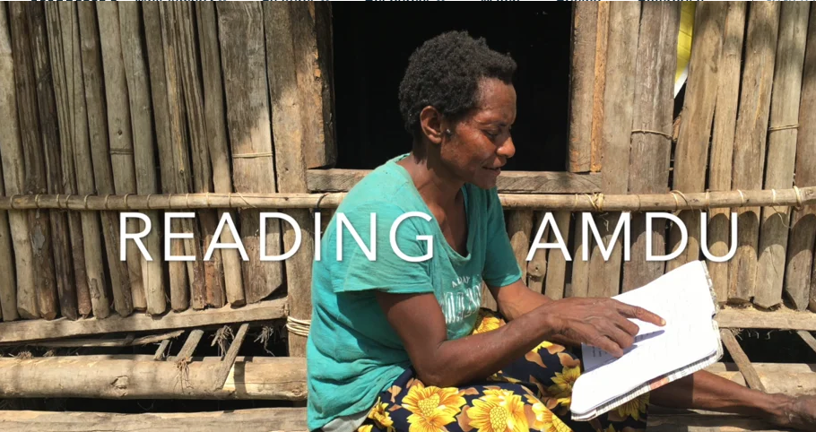 Amdu woman reading