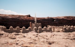 sand castle representing foundation