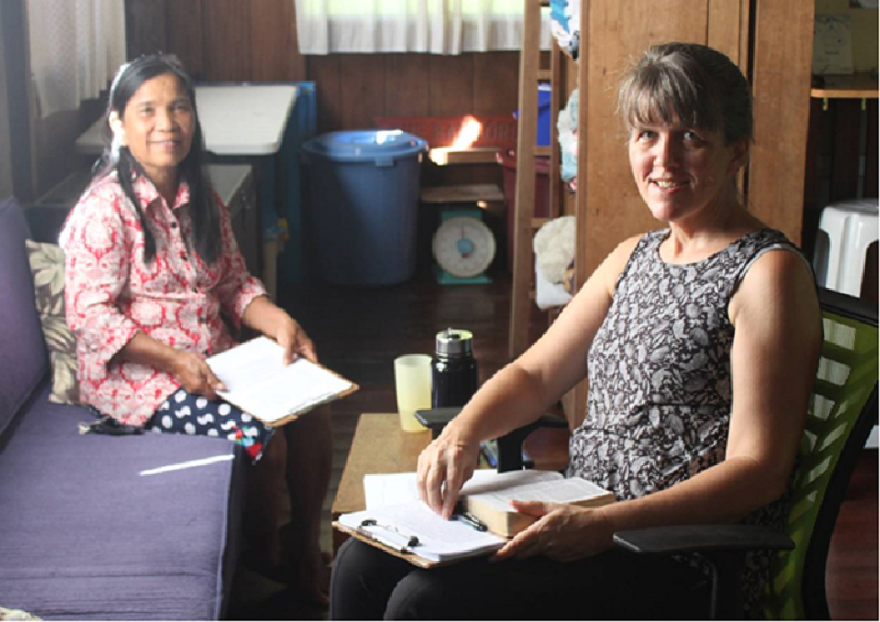 women translating the Bible together