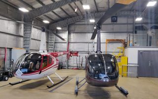 two r66 helicopters