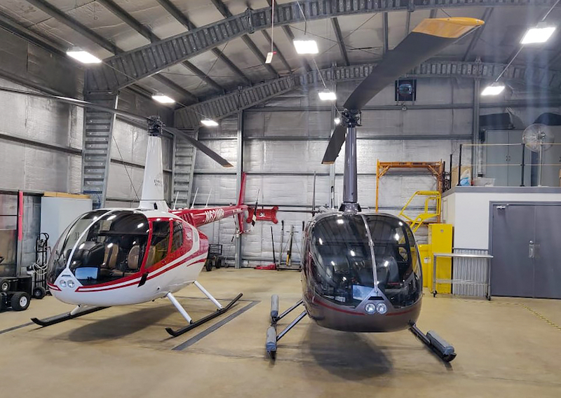 two r66 helicopters