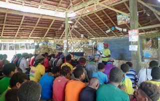 a man teaching in Masa