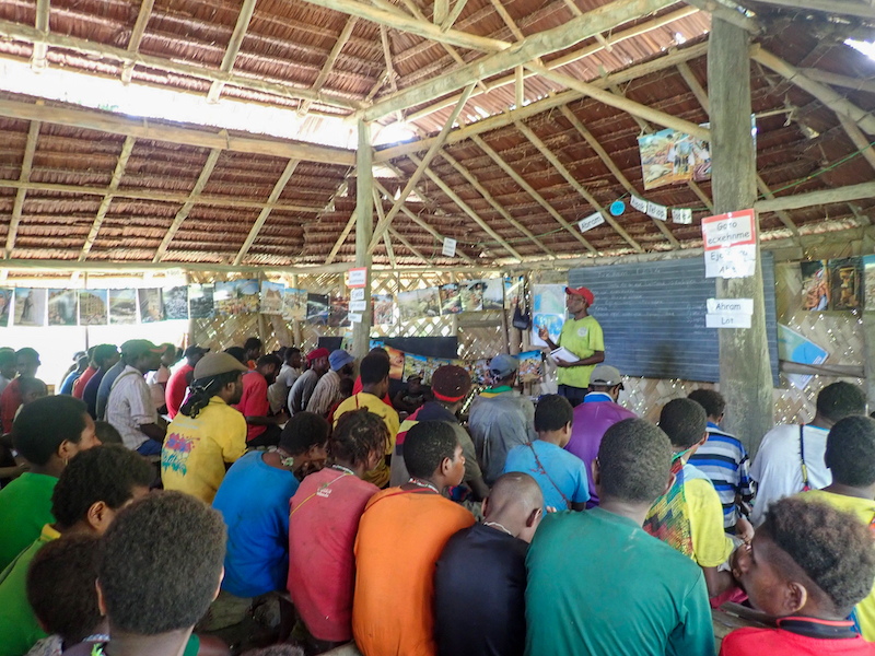 a man teaching in Masa