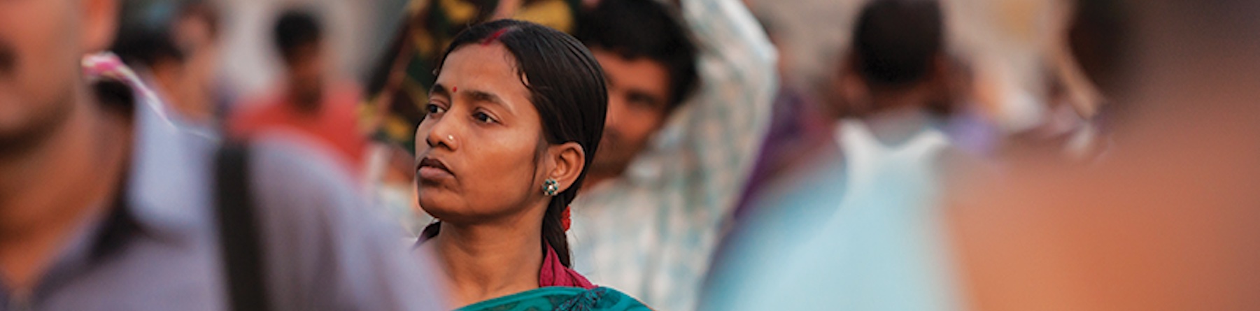 woman in a South Asia crowd