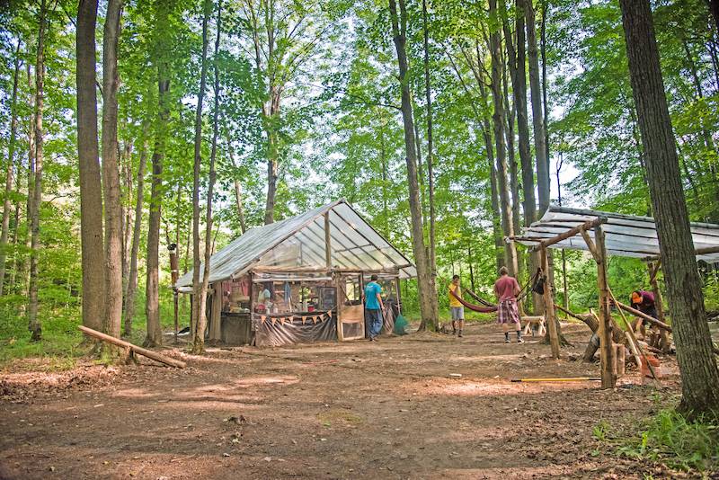 people visiting in the woods